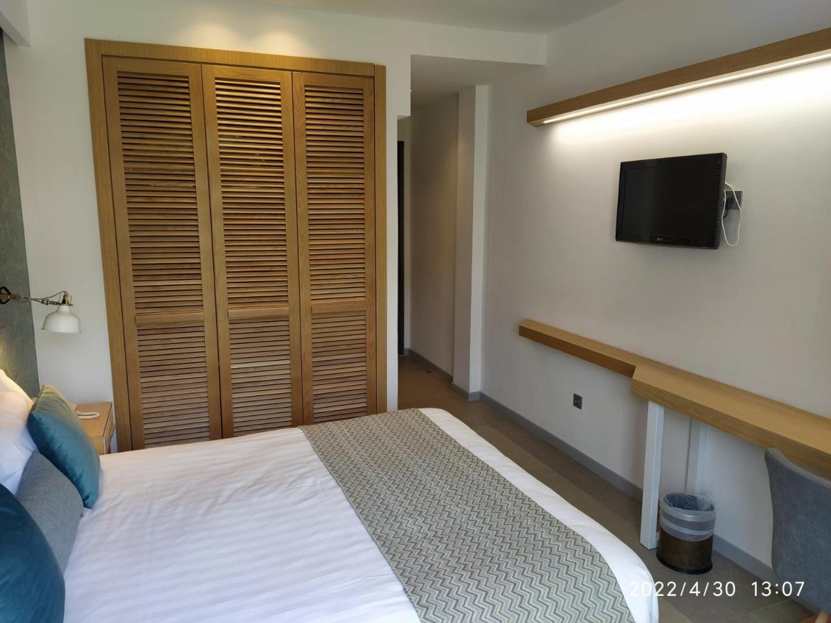 Minoa Hotel Toló Kültér fotó